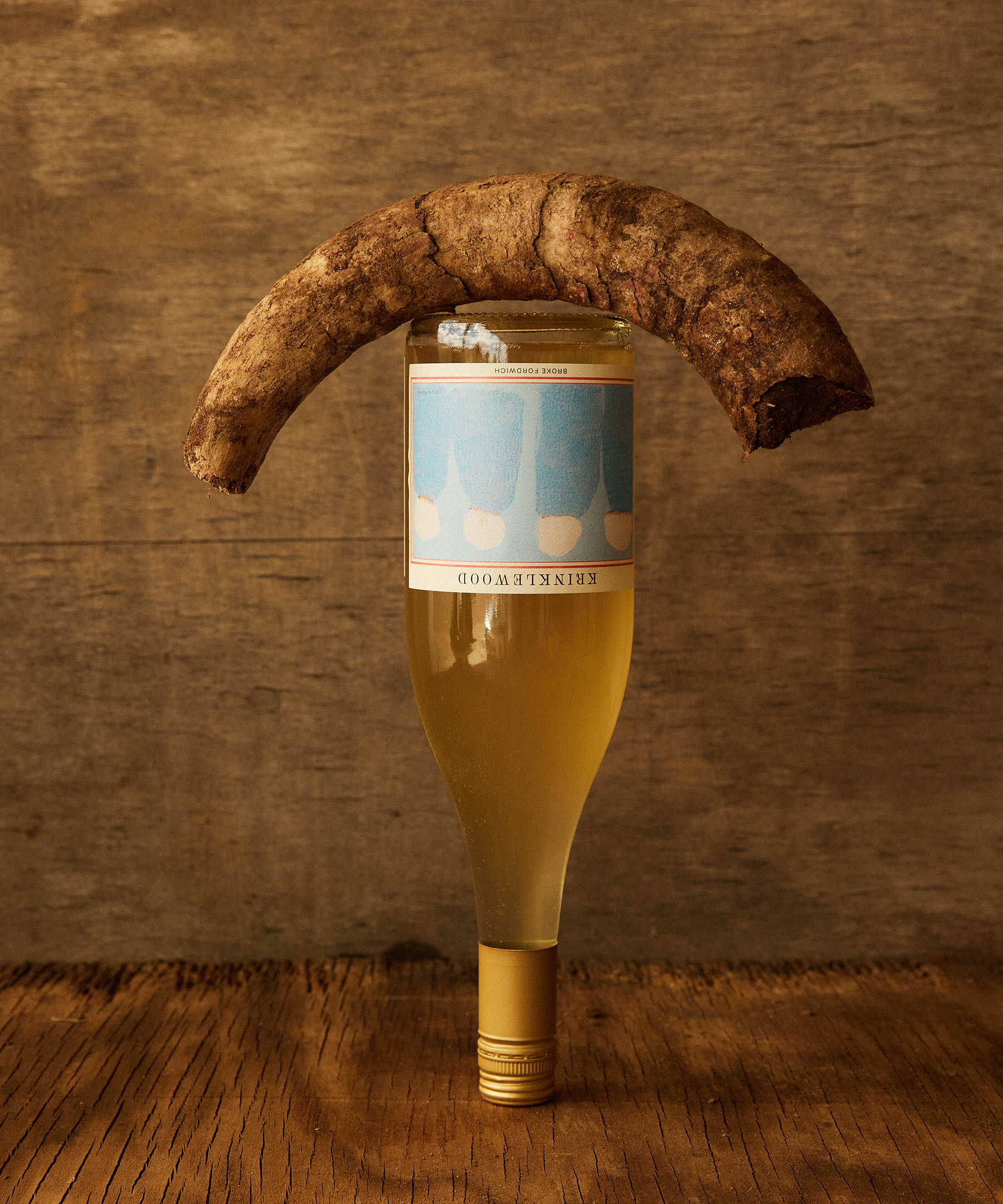 The vines, weathered and wise, grow with a patience born from the dance between sun and soil, a slow exchange of elements that cannot be hurried. Each root reaches deeper, not for more, but for what has always been there, waiting just below the surface.